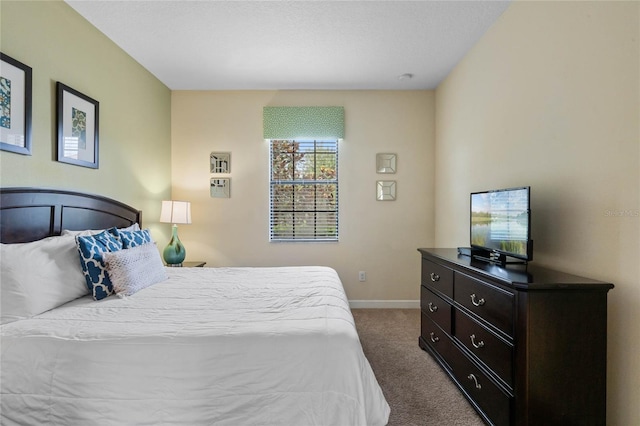 bedroom with dark carpet