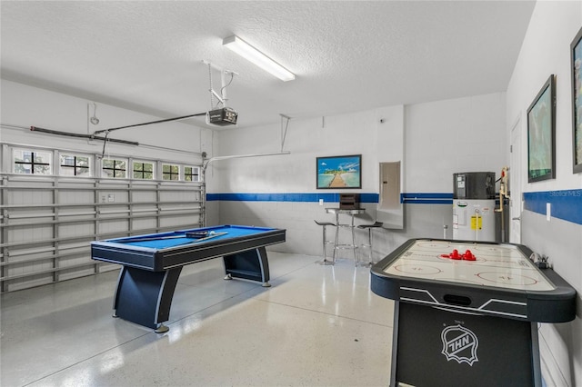 playroom featuring a textured ceiling, billiards, water heater, and electric panel