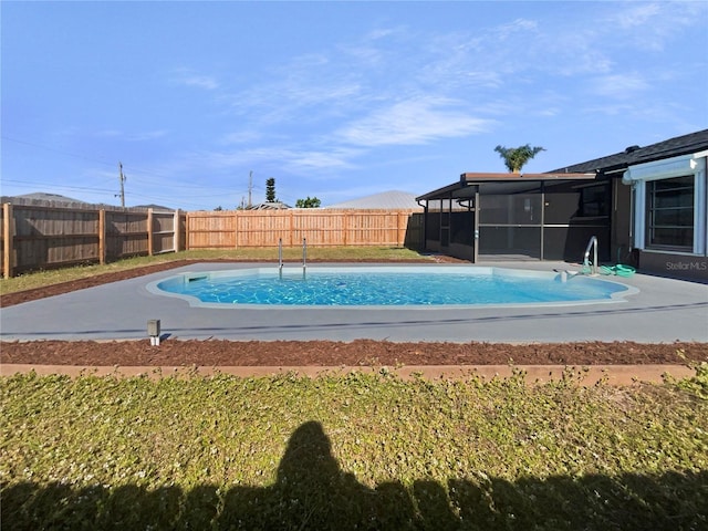 view of pool featuring a sunroom