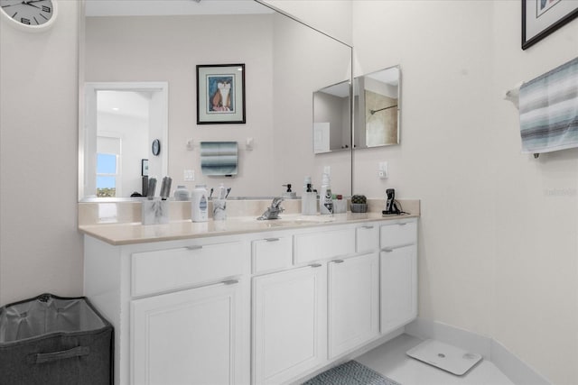 bathroom featuring tile patterned floors and vanity