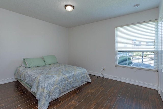 bedroom with multiple windows