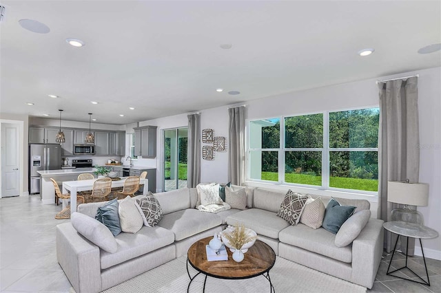 living room featuring light tile patterned floors