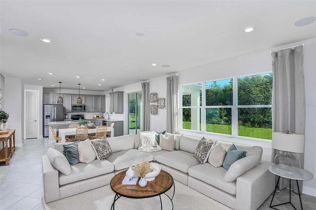 living room with light tile patterned flooring