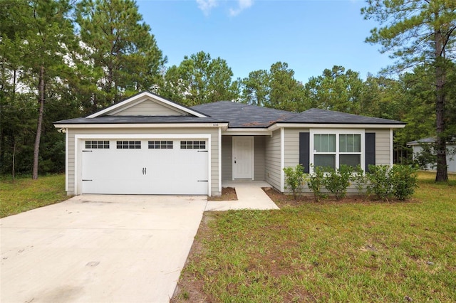 single story home with a front yard and a garage