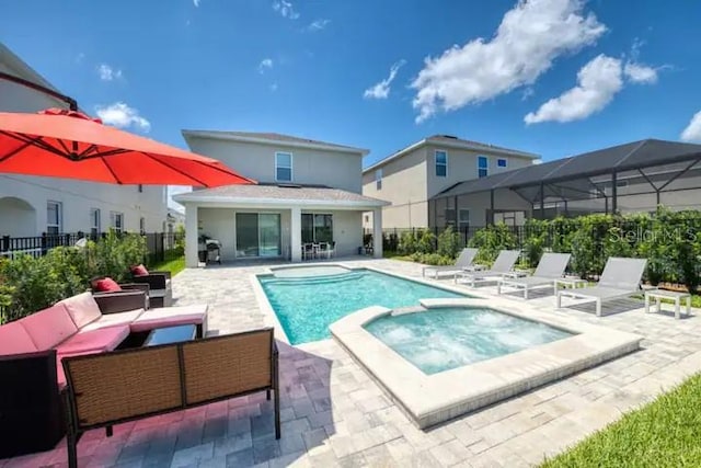 view of swimming pool featuring an outdoor living space, a patio area, and an in ground hot tub