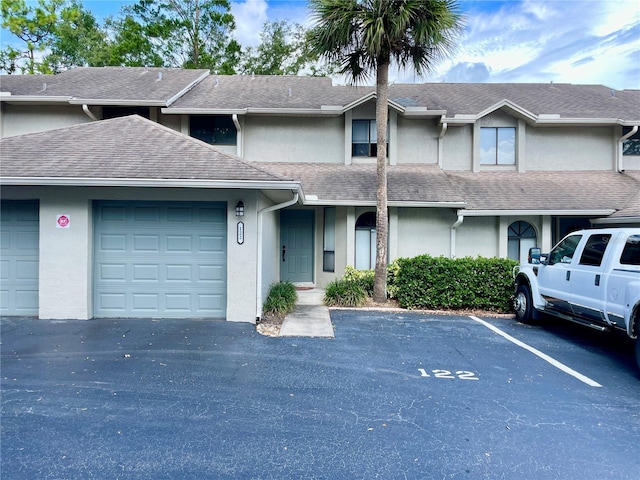 view of property featuring a garage