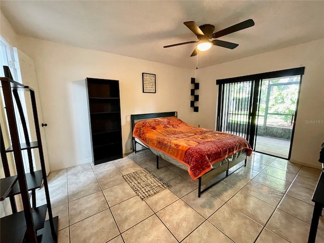 tiled bedroom with ceiling fan and access to outside