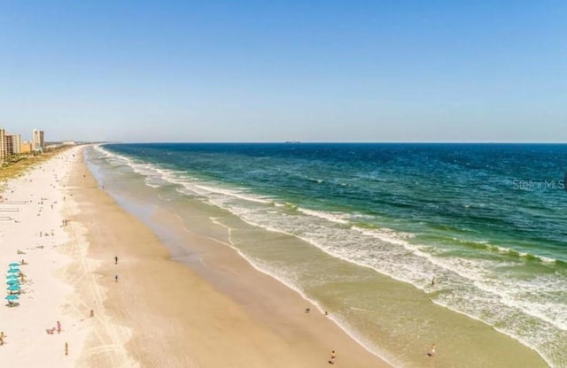 property view of water with a beach view