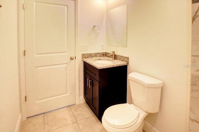 full bath with tile patterned flooring, toilet, vanity, and baseboards