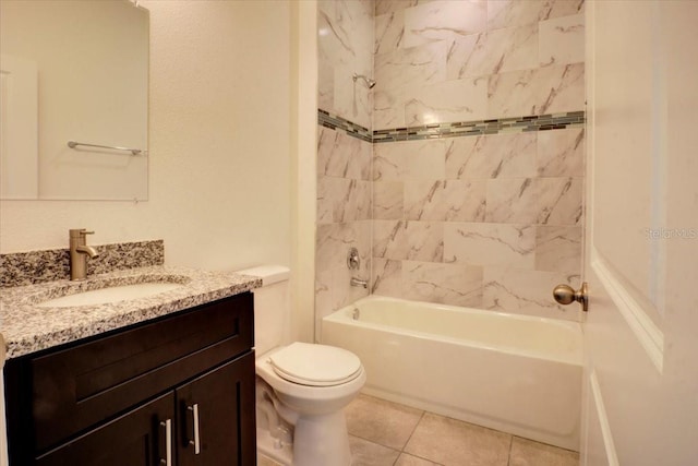 full bathroom with toilet, tile patterned flooring, vanity, and tiled shower / bath