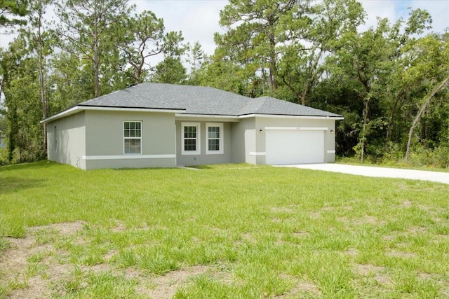 view of front facade with a front lawn and a garage