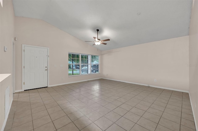 spare room with vaulted ceiling and ceiling fan