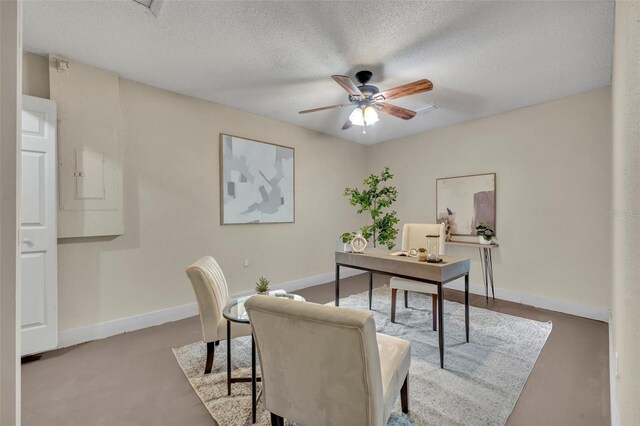 2519 Woods Edge Cir, Orlando, FL 32817 - office space featuring a textured ceiling, baseboards, and ceiling fan