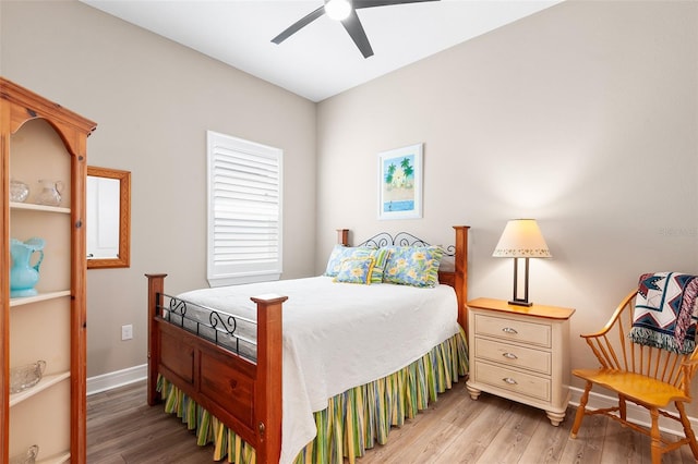 bedroom featuring ceiling fan and wood-type flooring