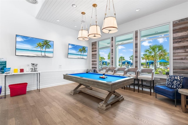 game room with hardwood / wood-style flooring, a wealth of natural light, wooden ceiling, and billiards