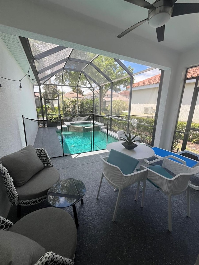 view of pool featuring a patio, a lanai, and ceiling fan