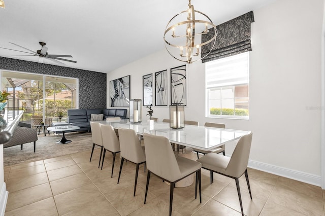 7416 Soiree Way, Reunion, FL 34747 - dining room with healthy amount of natural light, a chandelier, and light tile patterned floors
