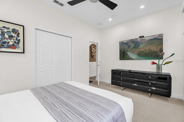 7416 Soiree Way, Reunion, FL 34747 - bedroom featuring carpet flooring, a closet, recessed lighting, and ceiling fan
