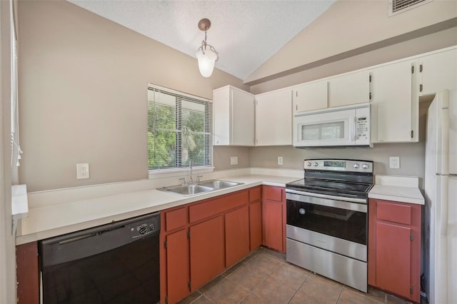 kitchen featuring sink, vaulted ceiling, white appliances, and white cabinets