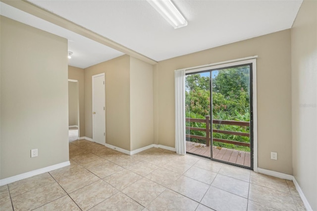 view of tiled spare room