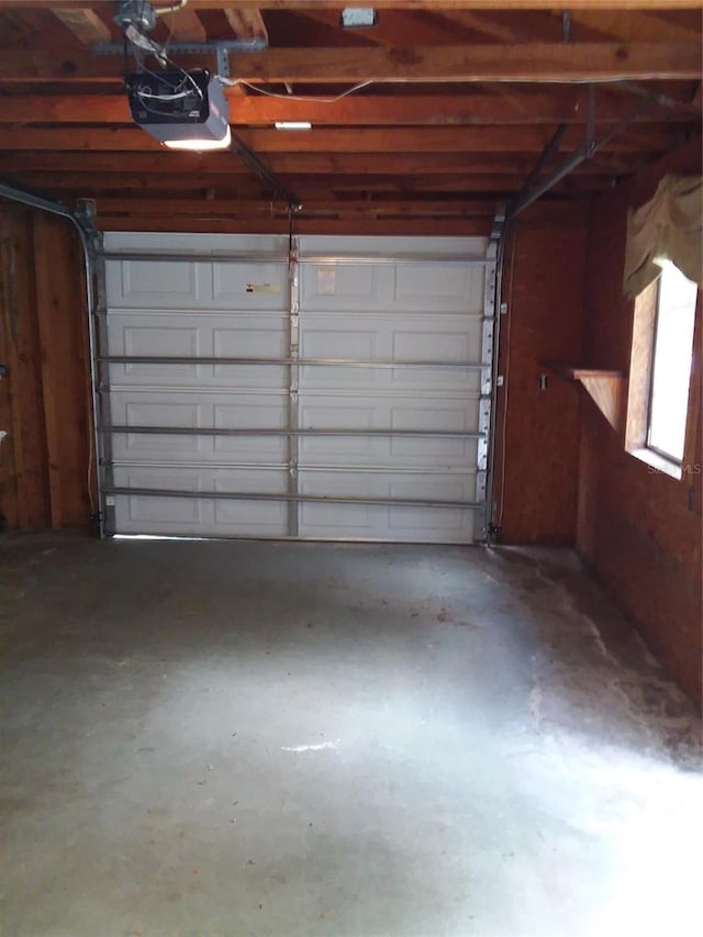 garage featuring a garage door opener