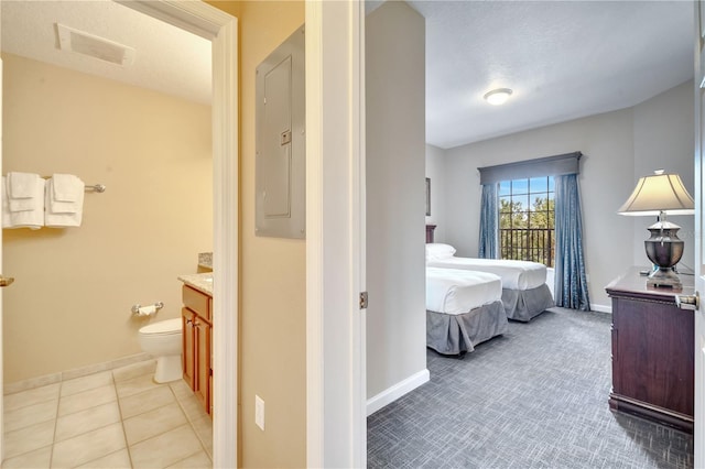 8801 Worldquest Blvd Unit 4406, Orlando, FL 32821 - ensuite bathroom with vanity, baseboards, and electric panel