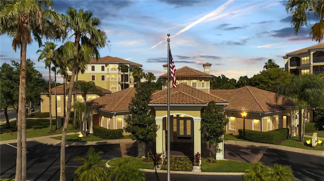 8801 Worldquest Blvd Unit 4406, Orlando, FL 32821 - exterior space featuring stucco siding, a tile roof, and french doors