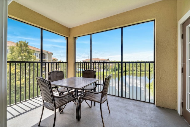 sunroom / solarium featuring plenty of natural light