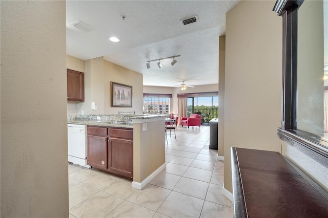 8801 Worldquest Blvd Unit 4406, Orlando, FL 32821 - kitchen featuring open floor plan, a textured ceiling, visible vents, dishwasher, and a ceiling fan