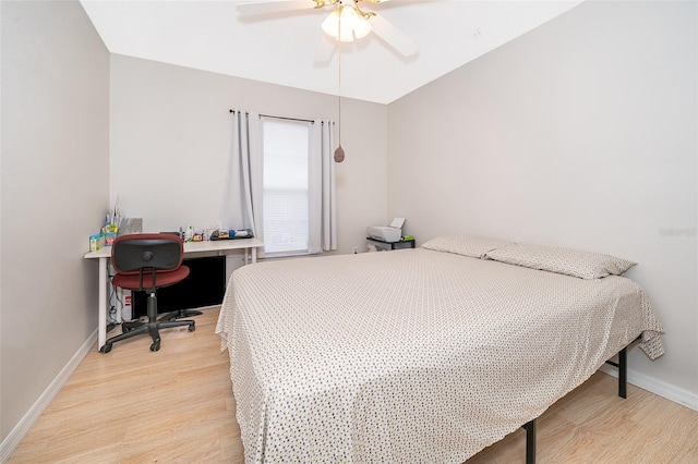 bedroom featuring ceiling fan and light hardwood / wood-style flooring