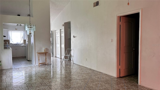 1204 Easton St, Orlando, FL 32825 - empty room featuring a textured ceiling and baseboards