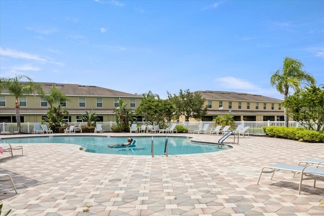 view of pool featuring a patio