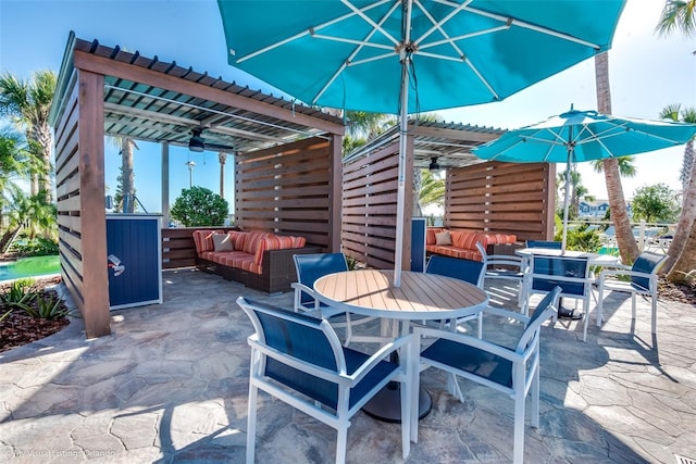 view of patio with outdoor lounge area and a pergola