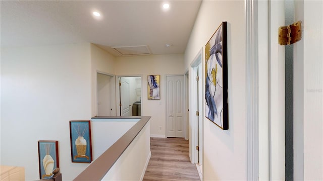 corridor featuring light hardwood / wood-style floors