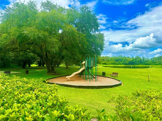 view of jungle gym with a yard