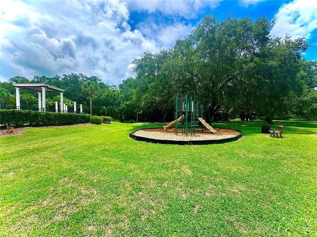 view of yard with a playground