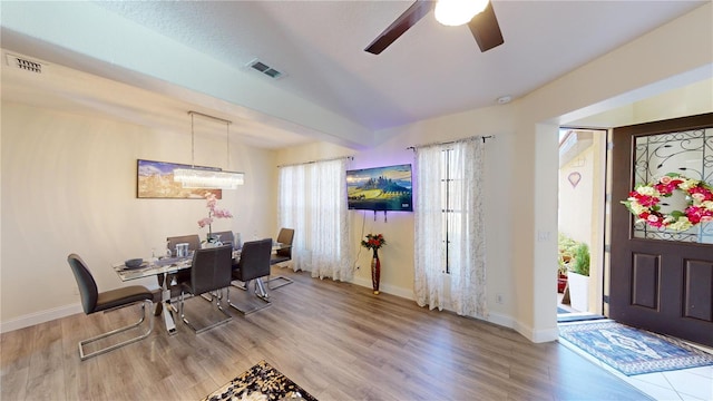 dining room featuring ceiling fan and light wood-type flooring