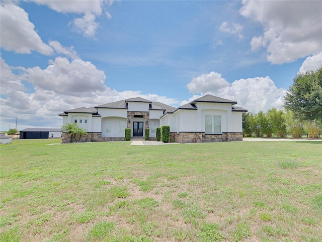 view of front of property with a front lawn