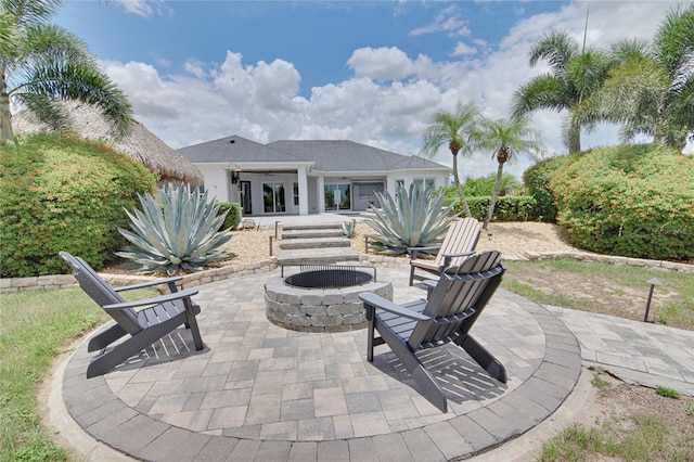 view of patio / terrace featuring an outdoor fire pit