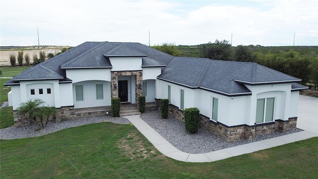 view of front of home featuring a front lawn