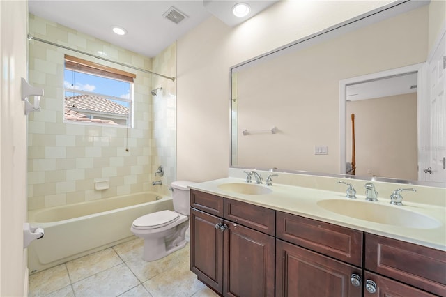 full bathroom with double vanity, tile patterned flooring, a sink, and bathing tub / shower combination