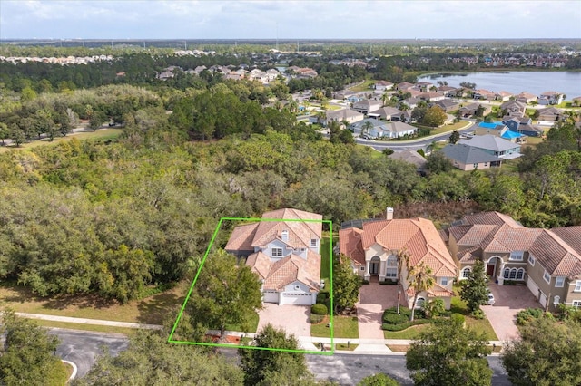 drone / aerial view with a water view