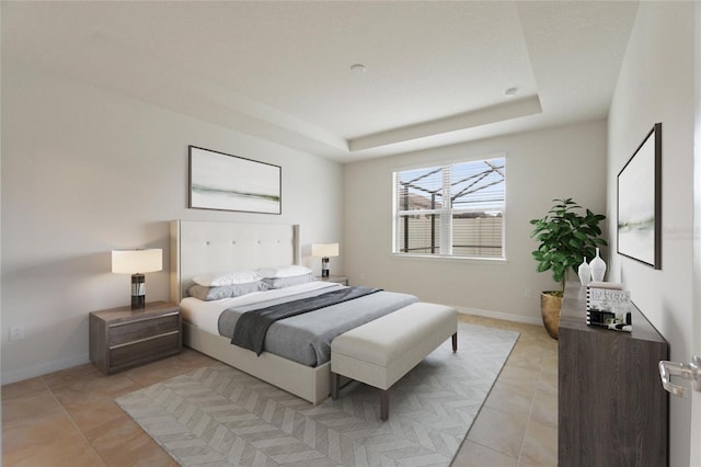 tiled bedroom featuring a tray ceiling