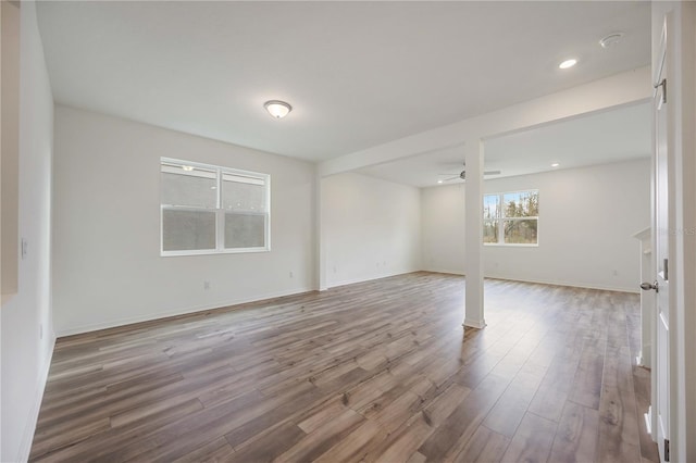 spare room with hardwood / wood-style flooring