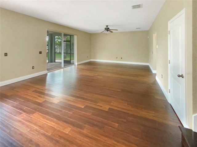 unfurnished room with wood-type flooring and ceiling fan