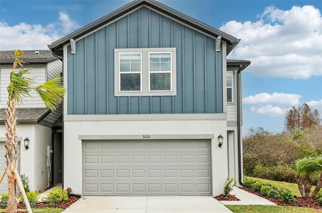 view of front of home with a garage