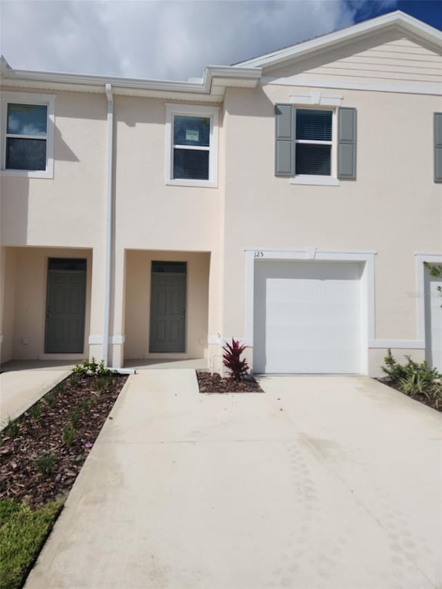 view of property featuring a garage