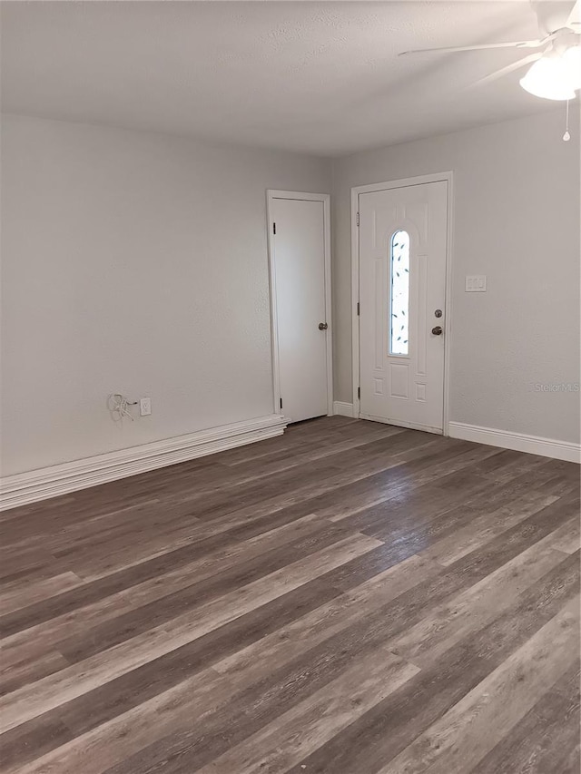 foyer featuring dark hardwood / wood-style floors and ceiling fan