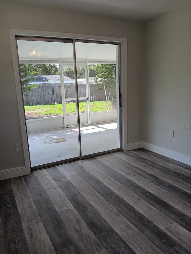 interior space with dark hardwood / wood-style flooring