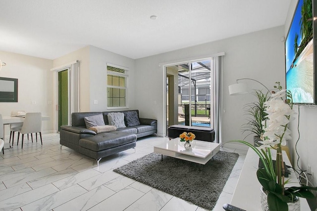 living room with a healthy amount of sunlight